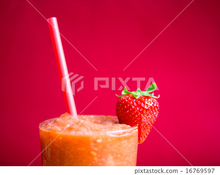 Strawberry smoothie in glass with straw - detail 16769597