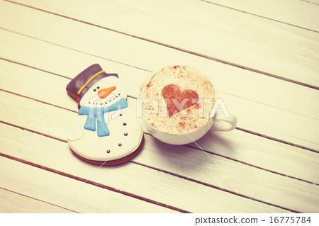 Cup of coffee and christmas gingerbread Cup of coffee and christmas gingerbread 16775784