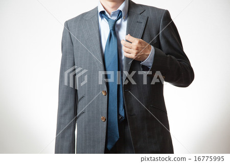 A businessman removing a tie A businessman removing a tie 16775995