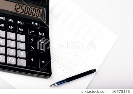 Business Charts with calculator and pen Business Charts with calculator and pen 16778376