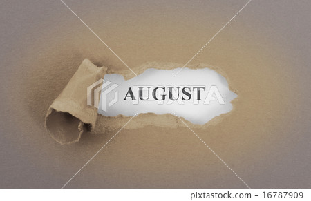 Text appearing behind torn brown envelop 16787909