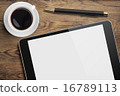 Tablet pc on table desk with coffee cup and pen 16789113