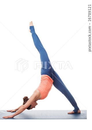 Sporty fit yogini woman practices yoga asana eka pada adhomukha  16789121