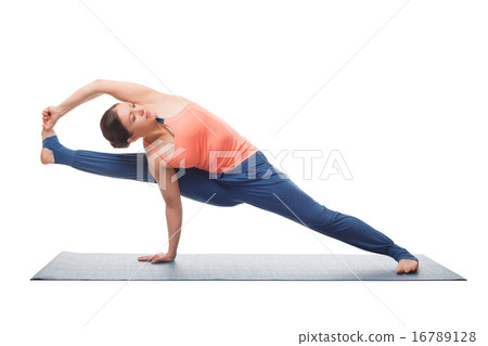 Beautiful sporty fit yogi girl practices yoga asana visvamitrasa 16789128