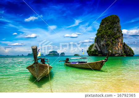 Long tail boats on beach, Thailand Long tail boats on beach, Thailand 16792365