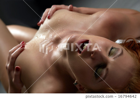 Passionate redhead woman screaming during orgasm 16794642