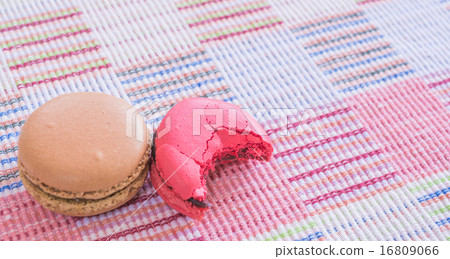 Sweet and colourful french macaroons on cotton cloth background. 16809066
