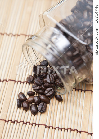 Coffee beans spilled from bottle Coffee beans spilled from bottle 16814746