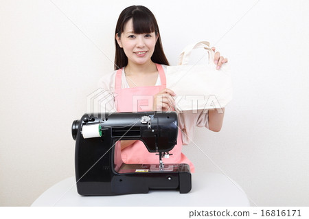 Housewives using sewing machines 16816171