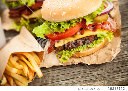 Delicious hamburger and fries Delicious hamburger and fries 16818132