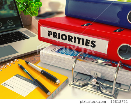 Red Office Folder with Inscription Priorities. 16818731