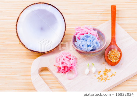 A colorful traditional coconut dessert . 16822024