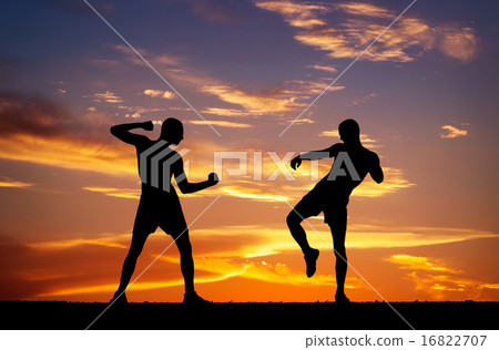 Silhouettes of two fighters  16822707