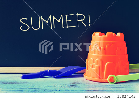 toy shovel and pail, and word summer in chalkboard 16824142