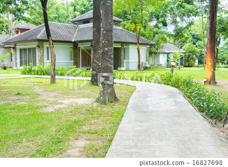 Pathway to residential. Manicured garden design. Pathway to residential. Manicured garden design. 16827698