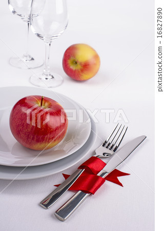 Celebration table set with red apples on white 16827890