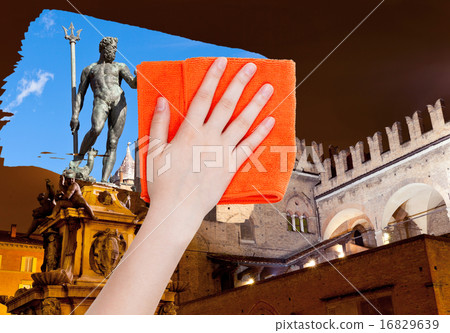 hand deletes Bologna night scene by orange cloth hand deletes Bologna night scene by orange cloth 16829639