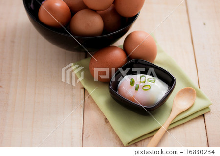 boiled eggs for breakfast on wooden table. 16830234