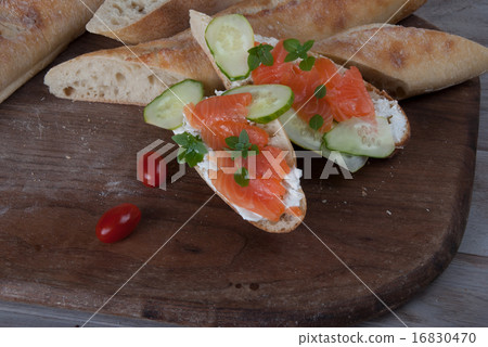Slised Freshly Baked Baguette with Smoked Salmon Slised Freshly Baked Baguette with Smoked Salmon 16830470