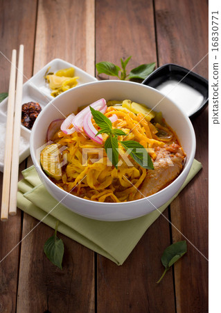 Curried Noodle Soup (Khao soi) with coconut milk Curried Noodle Soup (Khao soi) with coconut milk 16830771