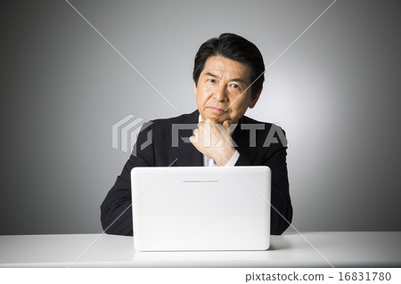 Business image Middle male who operates PC Business image Middle male who operates PC 16831780