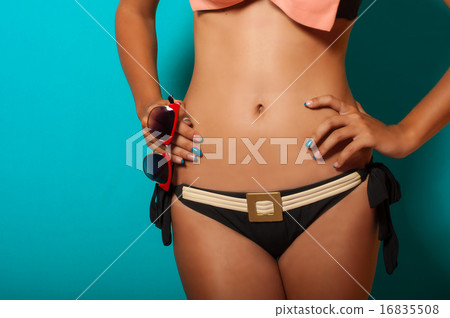 waist girl in bikini with sunglasses 16835508