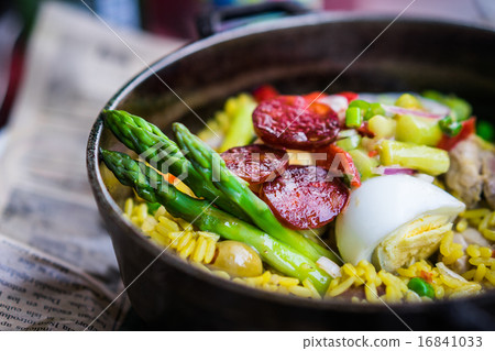 Chicken paella with vegetables Chicken paella with vegetables 16841033
