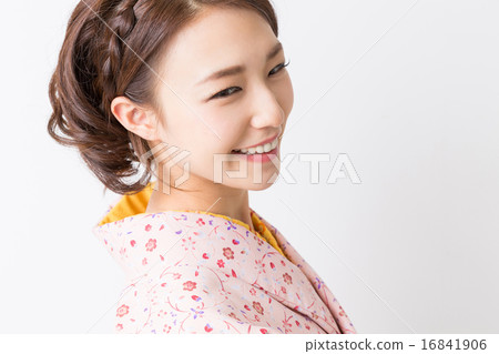 A woman in a kimono A woman in a kimono 16841906