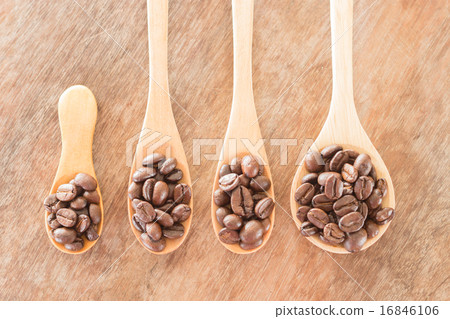 Coffee spoons on grunge wooden table Coffee spoons on grunge wooden table 16846106