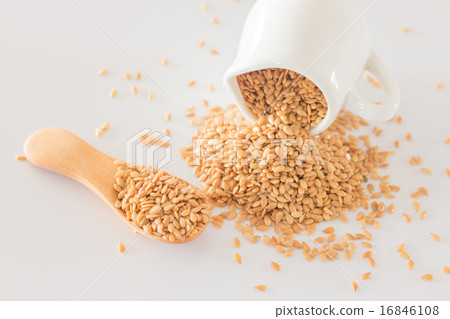 Yellow flax seed on clean kitchen table Yellow flax seed on clean kitchen table 16846108