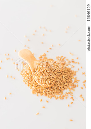 Yellow flax seed on clean kitchen table Yellow flax seed on clean kitchen table 16846109
