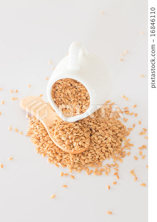 Yellow flax seed on clean kitchen table Yellow flax seed on clean kitchen table 16846110