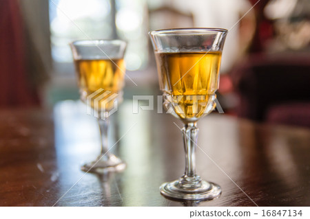 Two sherry glasses placed on the table 16847134