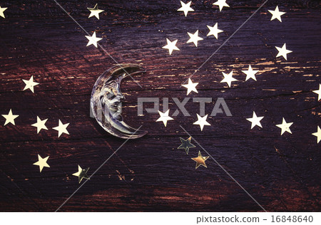 Glitter golden stars and glass moon on grunge wood Glitter golden stars and glass moon on grunge wood 16848640