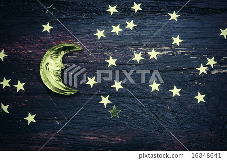 Glitter golden stars and glass moon on grunge wood Glitter golden stars and glass moon on grunge wood 16848641