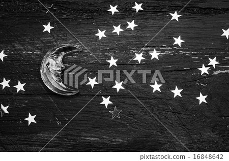 Glitter golden stars and glass moon on grunge wood Glitter golden stars and glass moon on grunge wood 16848642
