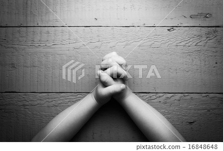 Child's hands folded together in prayer. Child's hands folded together in prayer. 16848648