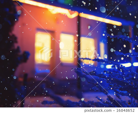 Illuminated windows at night. Winter, snowfall. Illuminated windows at night. Winter, snowfall. 16848652