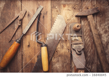 Od vintage hand tools on wooden background. 16848845