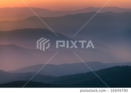 Distant mountain range and thin layer Distant mountain range and thin layer 16849790