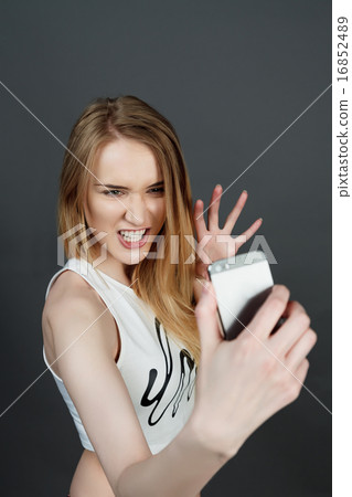 young pretty blonde women taking selfie young pretty blonde women taking selfie 16852489