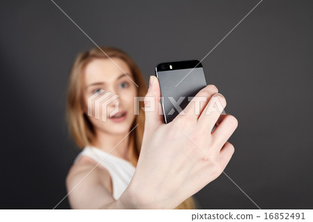 young pretty blonde women taking selfie young pretty blonde women taking selfie 16852491