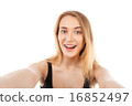 young pretty blonde women taking selfie 16852497