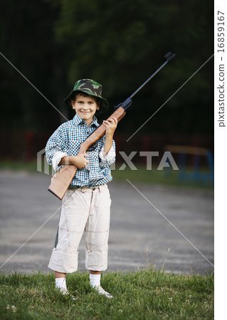 little boy with airgun outdoors little boy with airgun outdoors 16859167