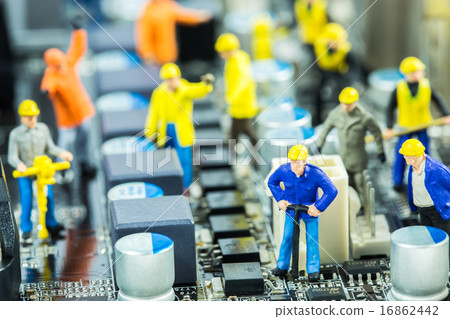 Team of engineers repairing circuit mother board 16862442