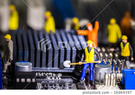 Team of engineers repairing circuit mother board 16864397