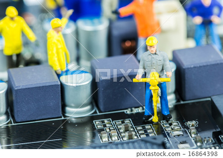 Team of engineers repairing circuit mother board 16864398
