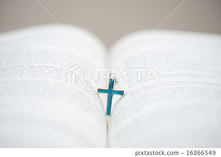 Bible and the Cruxific in middle of page Bible and the Cruxific in middle of page 16866549