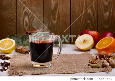 Mulled wine,punch spices glintwine on wooden table Mulled wine,punch spices glintwine on wooden table 16868579