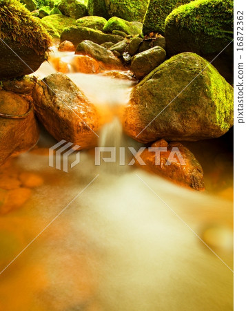 Cascades in rapid stream of mineral water. Cascades in rapid stream of mineral water. 16872362